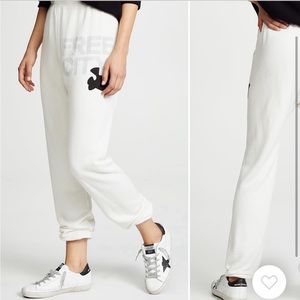 Sweatpants Creamy Yumm off white worn hand full of times